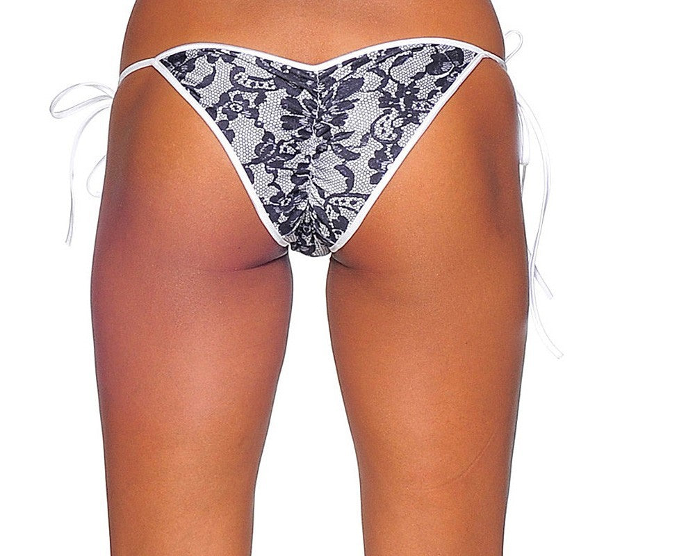 Mutandine sexy donna vita bassa in lycra stretch con fantasia effetto pizzo e laccetti sui fianchi vista posteriore