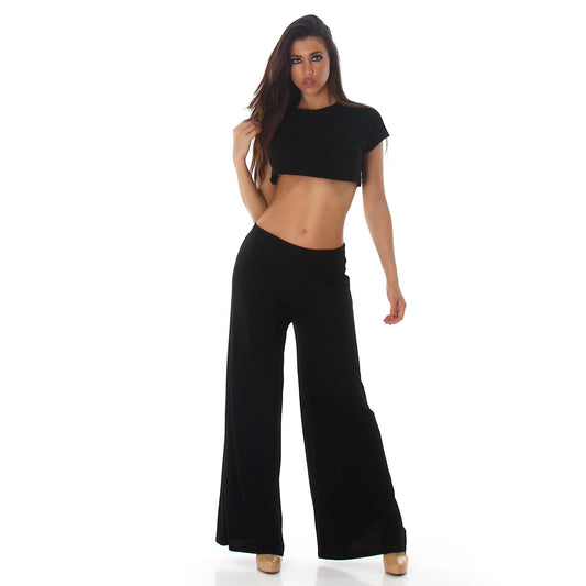 Completo donna nero top e pantaloni in tessuto elastico